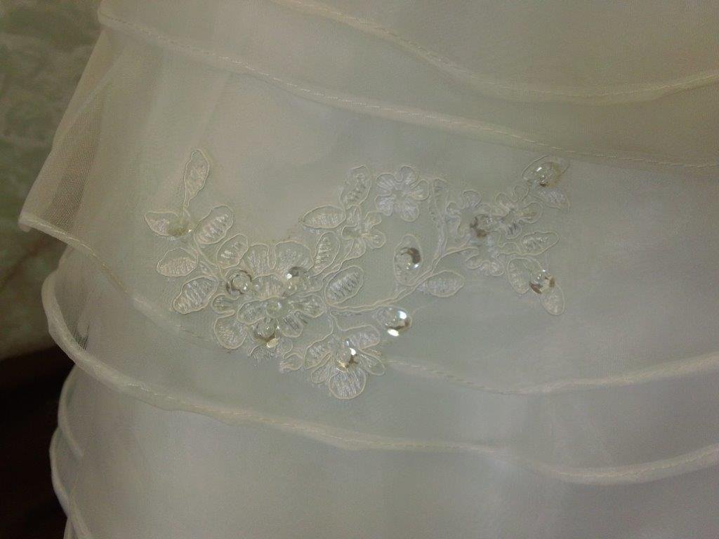 beaded applique on ruffle flower girl dress